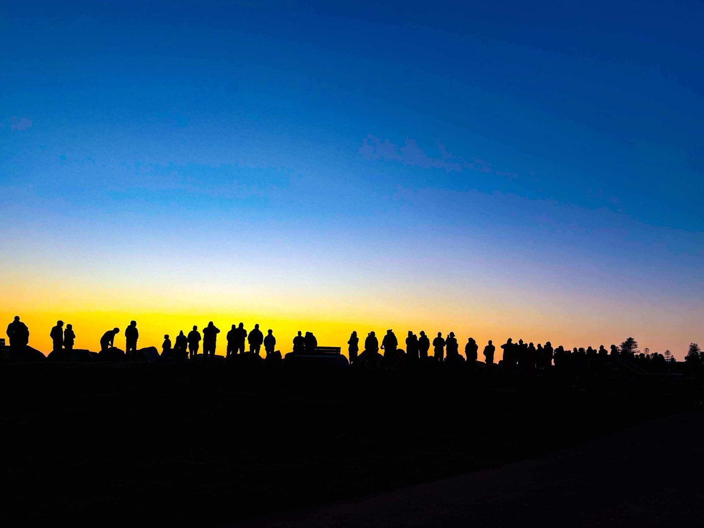 Walkers gathered at dawn for the Out of the Shadows Walk